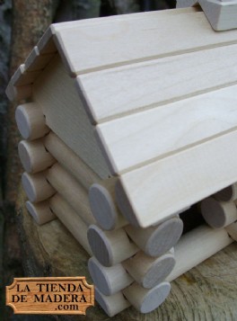 En la tienda de madera .com puedes comprar este original juego de piezas de madera para que los niños jueguen a hacer casitas